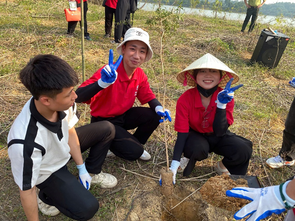 young people planting trees