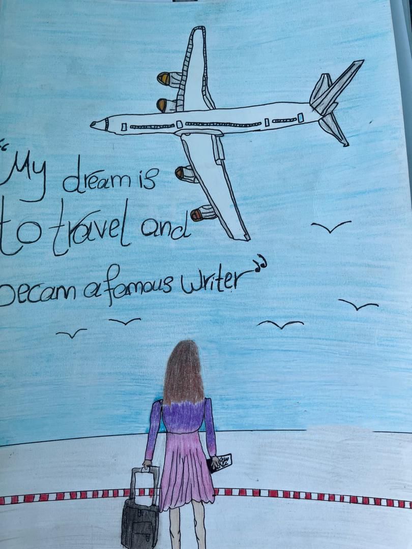 Drawing by a child in Gaza of a girl looking at a plane and the copy saying their dream is to travel the world and become a famous writer