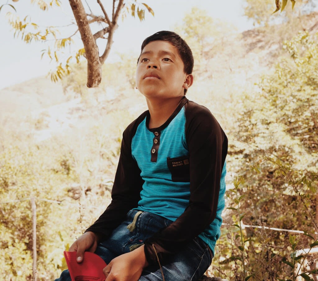 Walmar, 11, outside his home in the Dry Corridor region of Guatemala