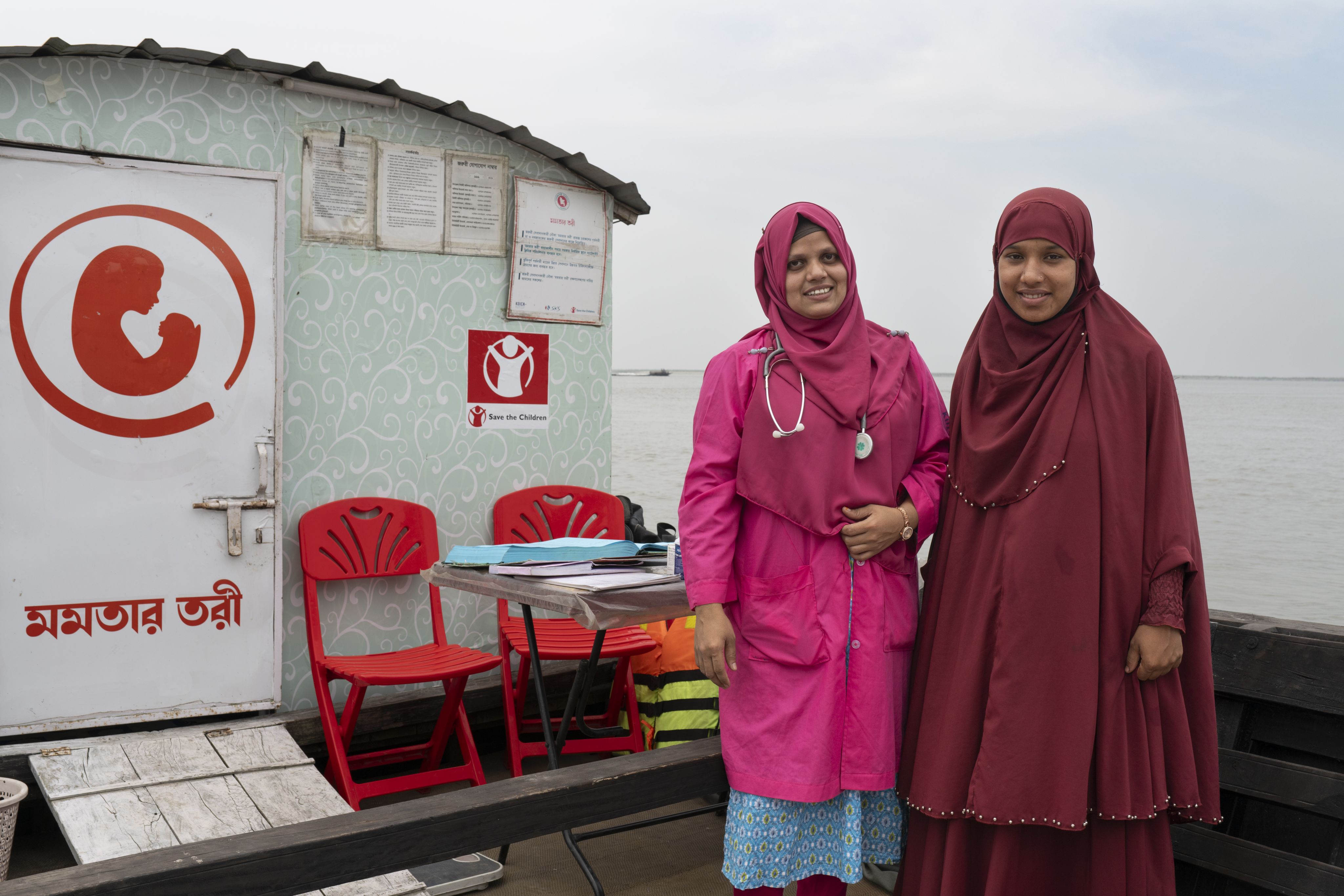 5-months pregnant Tisha* attends a check-up with Nargis, a midwife at a satellite clinic run by Save the Children's Mamota project to support Char communities in Gaibandha, Bangladesh.