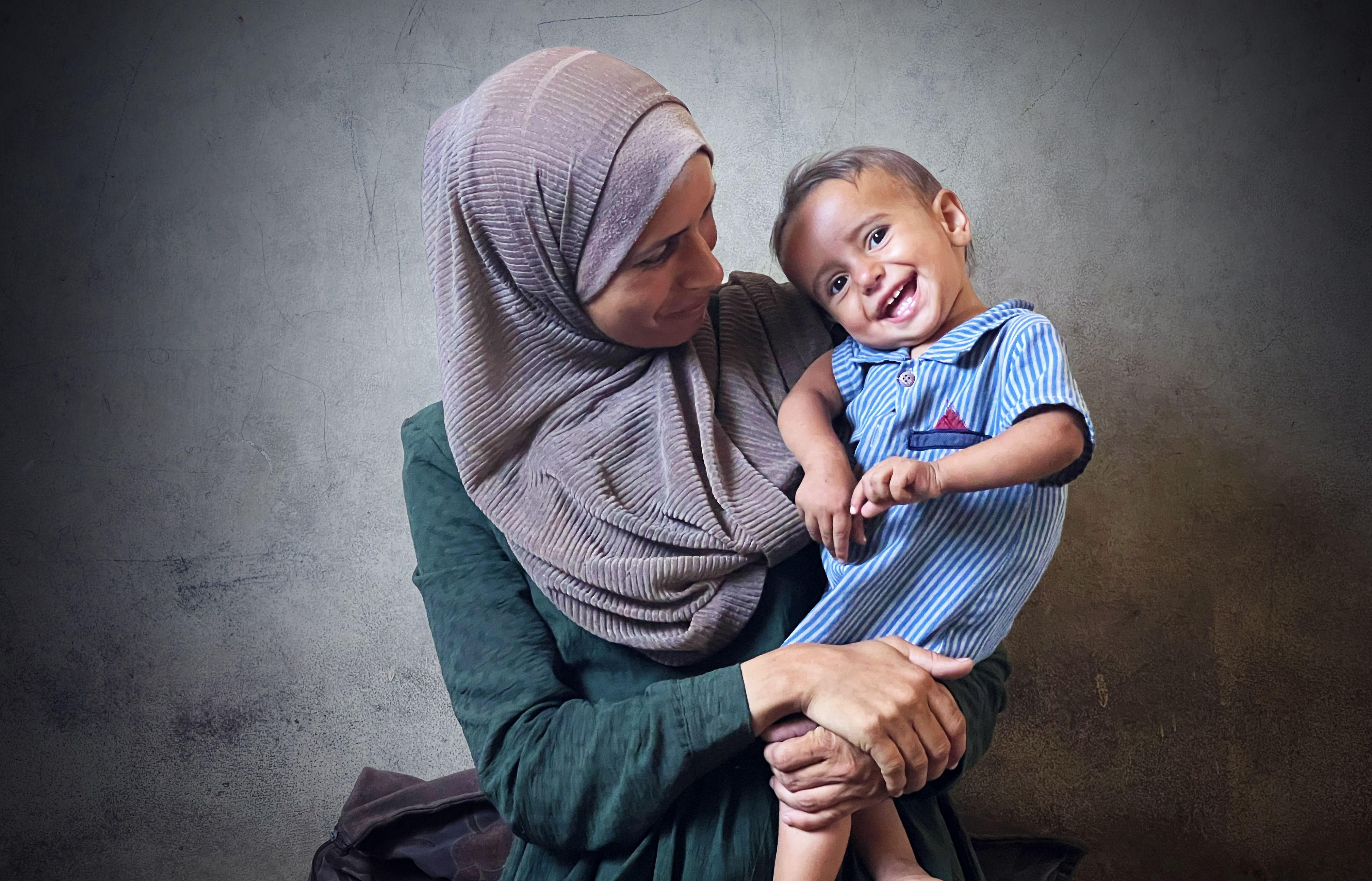 Rawan*, 12, who evacuated from Gaza takes part in a photography workshop run by Save the Children in Egypt.