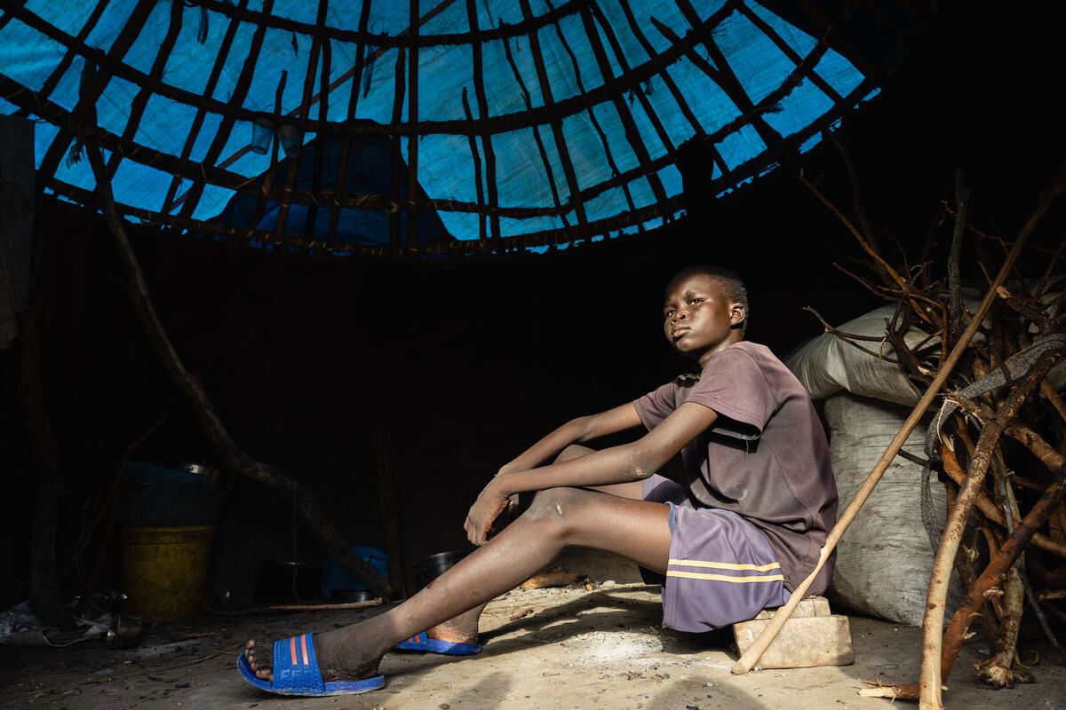 Jok*, 12, inside his home in Akobo West, South Sudan. Photo: Esther Mbabazi / Save the Children
