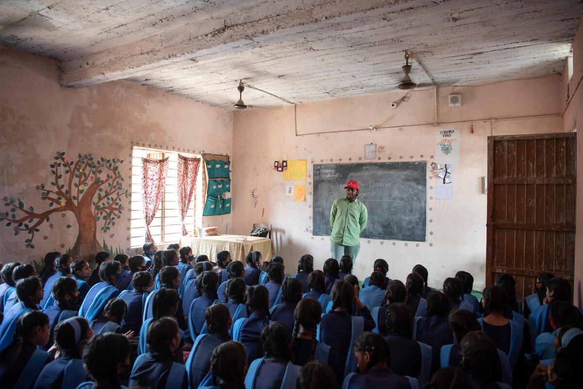 Krishna speaks to children about their rights at a school in Patna.