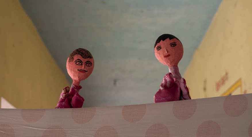 Krishna performs a puppet show about extreme heat in his slum in Patna, India.