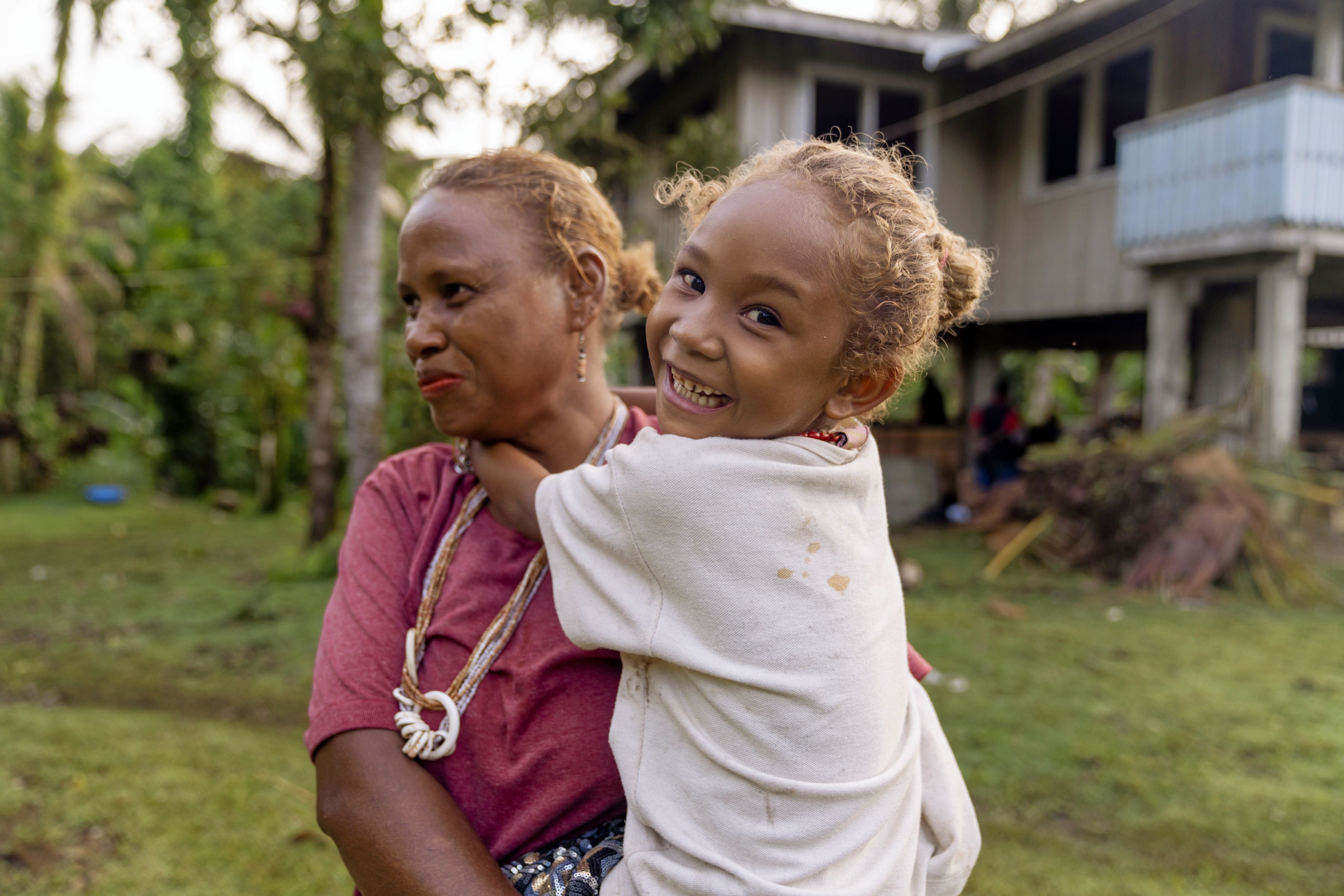 Alison, 43, and her daughter Lucy, four, in a remote community in Malaita Province, the Solomon Islands.
