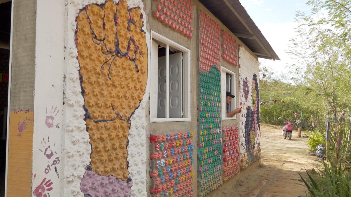 A house called 'Chica Street' that Oriana*, 15, helped to build out of recycled plastic bottles in Norte de Santander, Colombia.