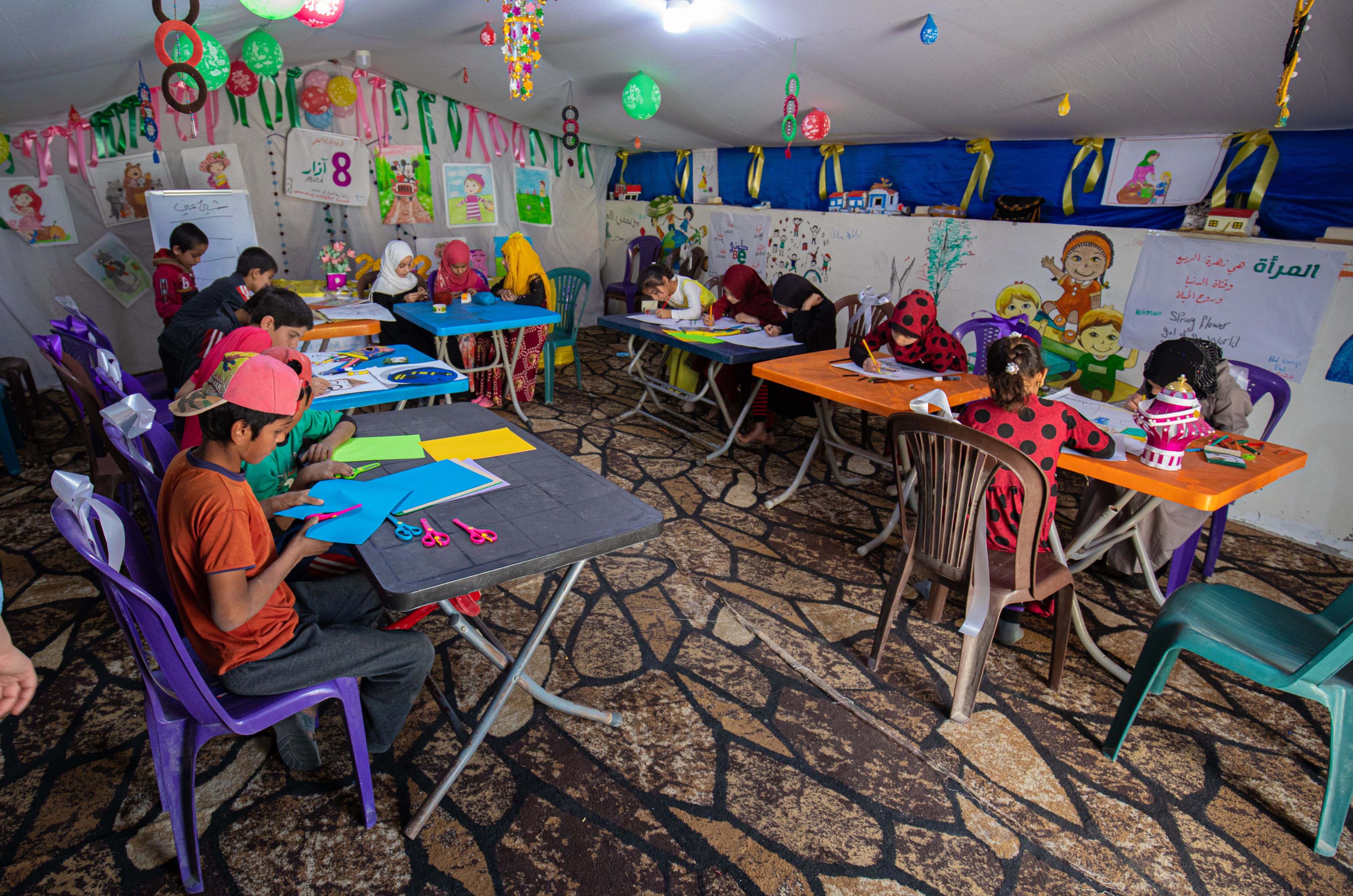 Children participating in craft workshops for Ramadan in the child friendly space, Al Hol camp, Syria.