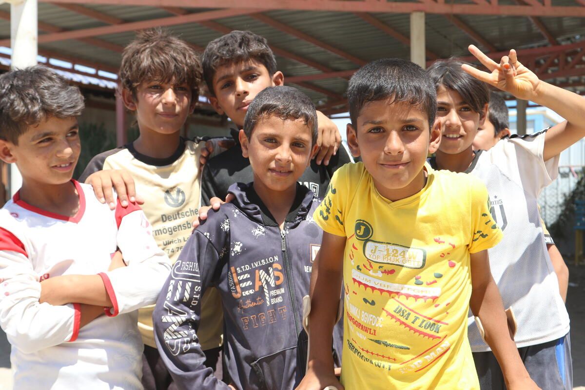 Ammar*, 11, with his friends - Haysam*, Ahmed*, Bahjat*, Heesham*, & Farid* - at a Child-Friendly Space supported by Save the Children in a displacement camp in North East Syria