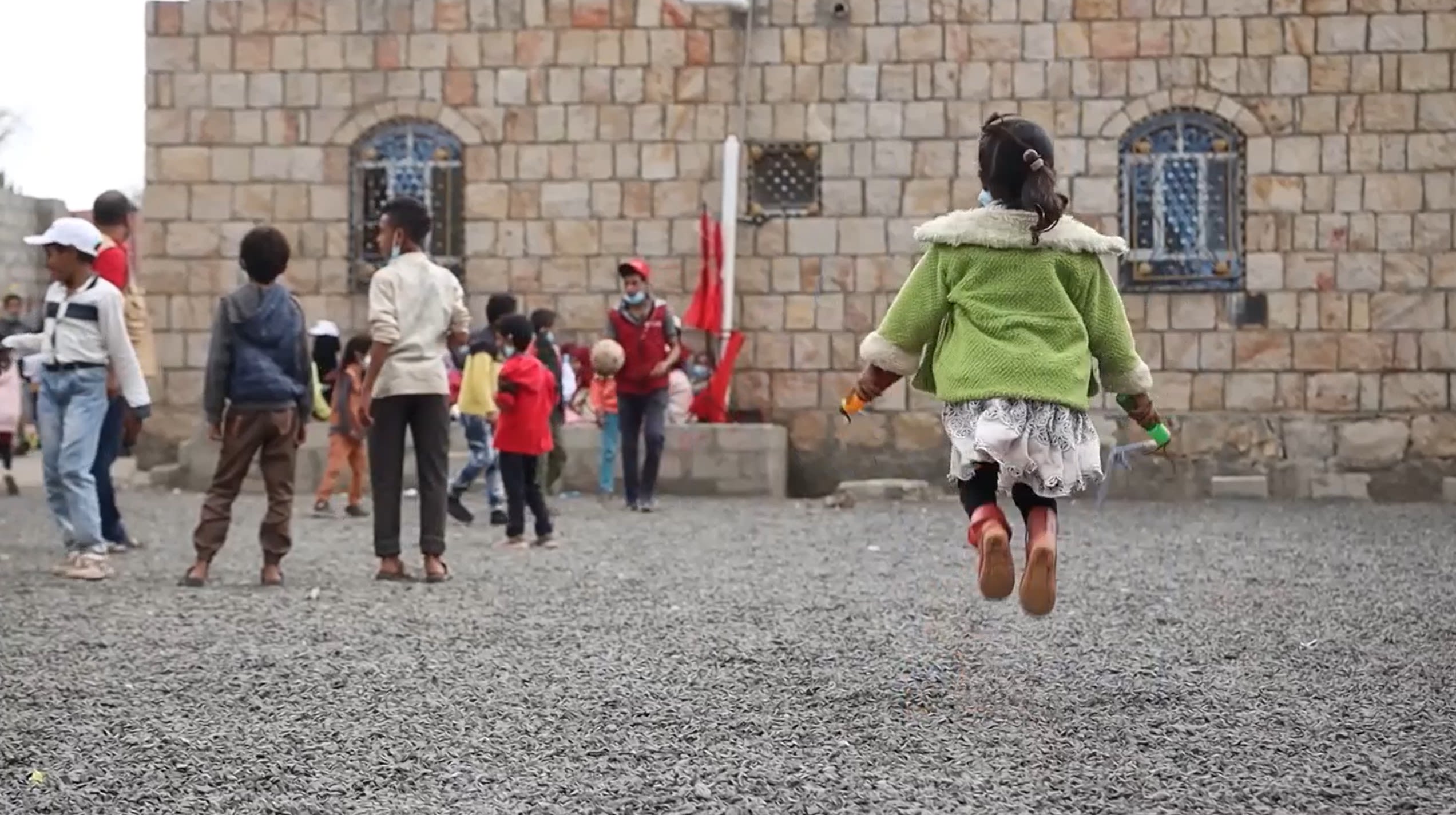A young girl skipping in the play area of the social centre Taiz, Yemen. Photo: Save the Children.