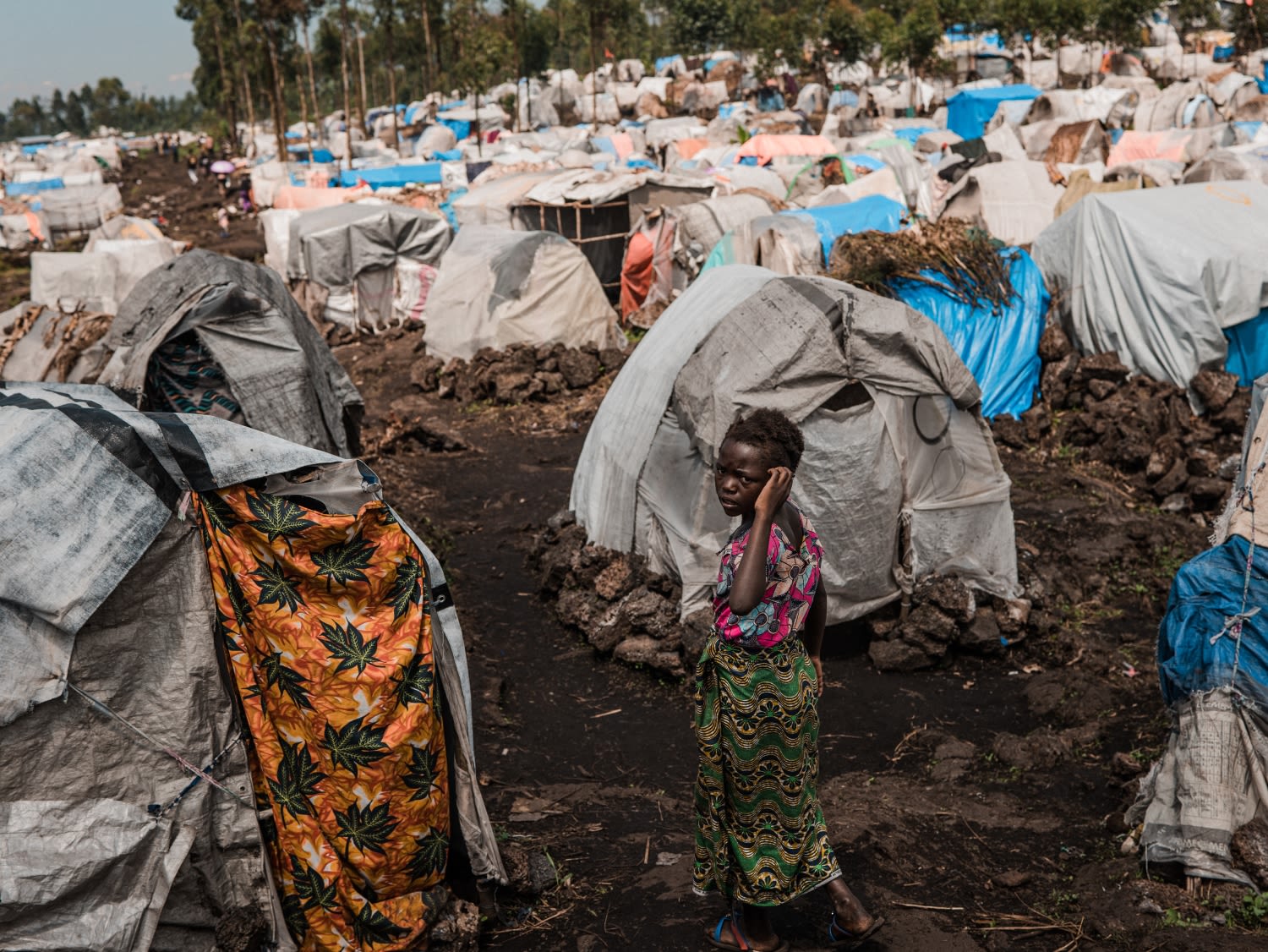 Liliane*, 13, in the camp where she is now living