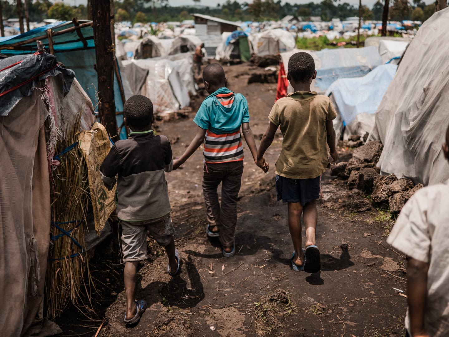 Children walk to the Child Friendly Space in the camp