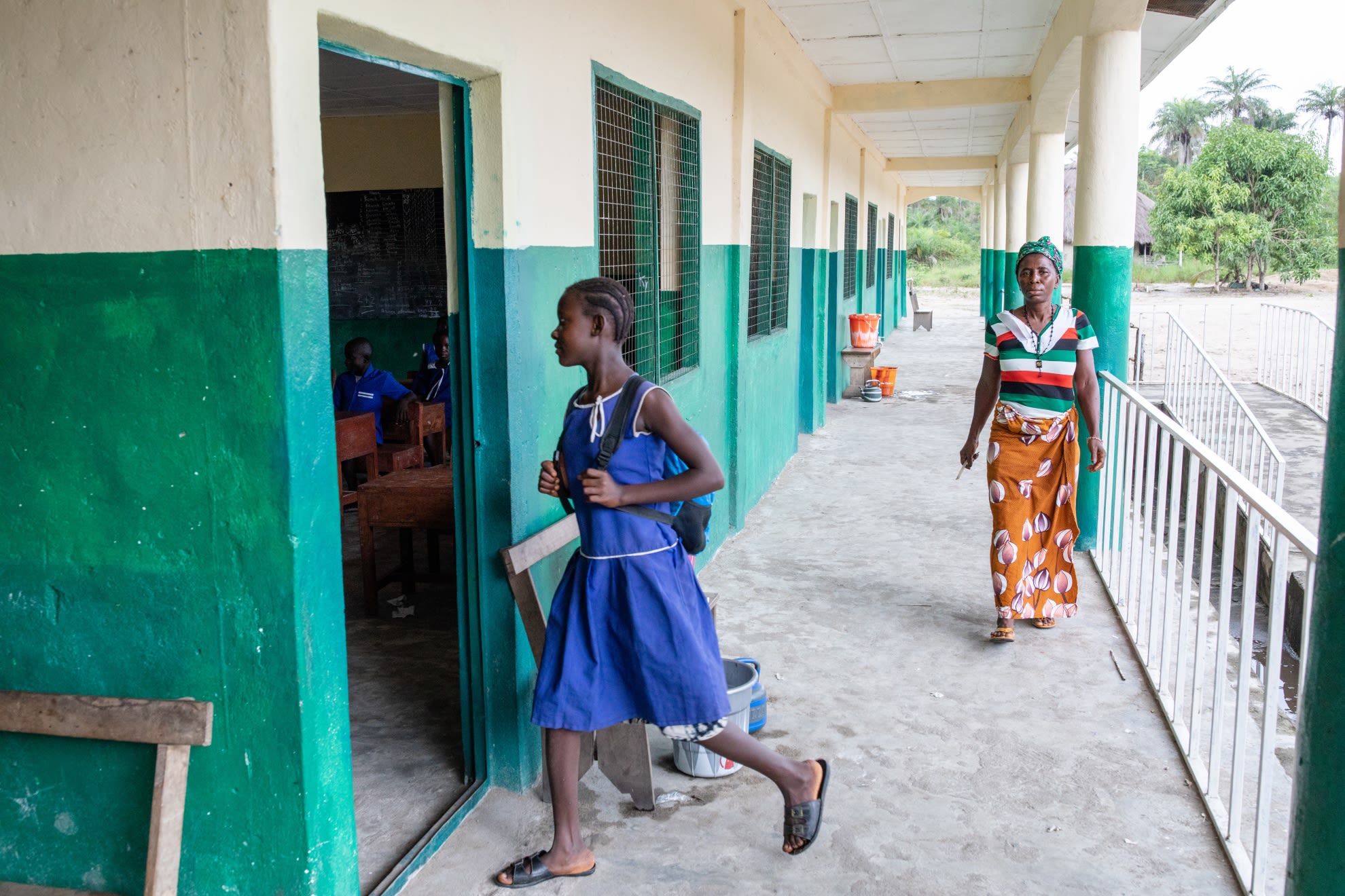 Tenneh, aged 13, arriving for class at her school in Pujehun district, Sierra Leone