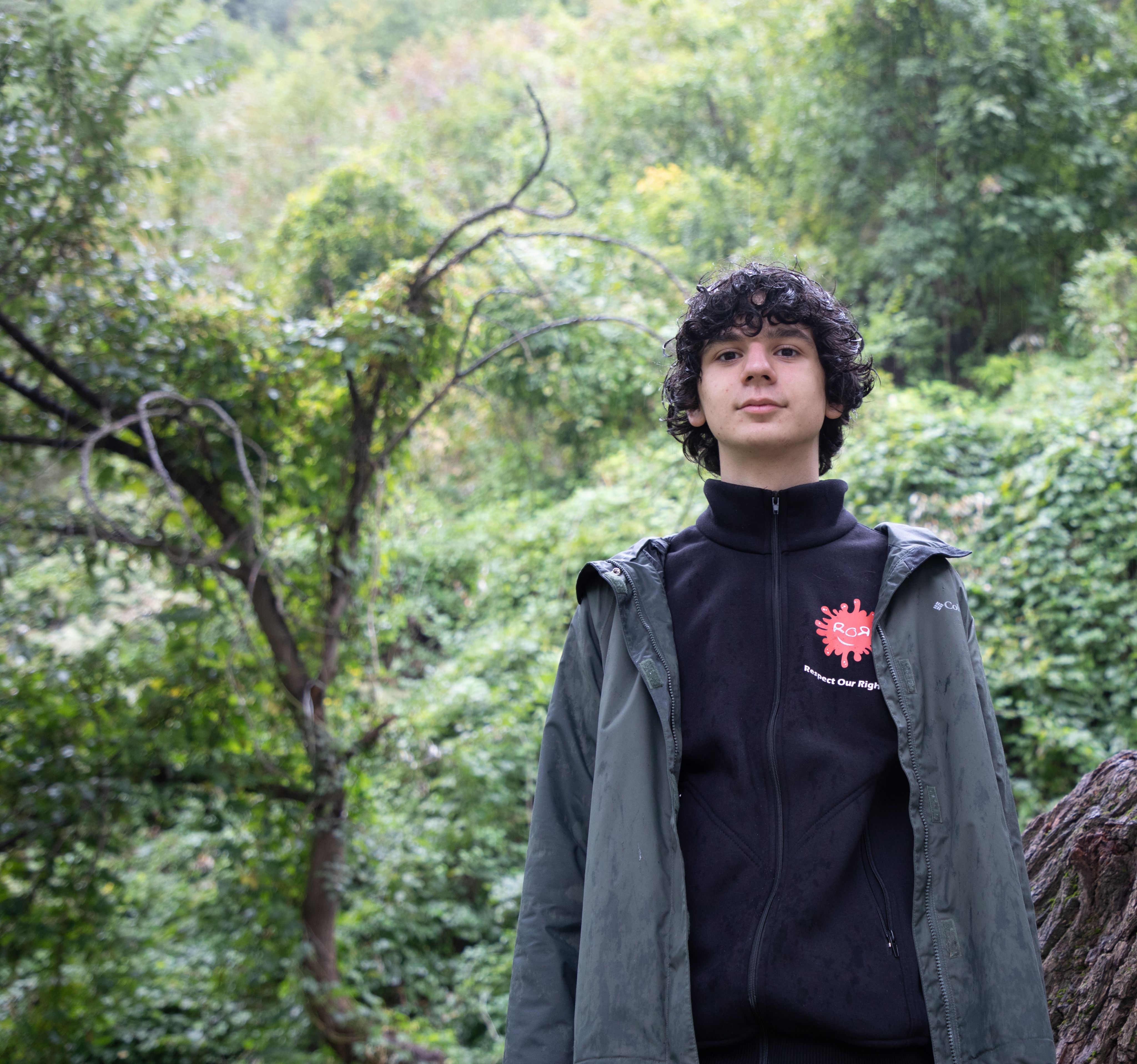 Portrait of Olt, 16, walking in the mountains in his hometown of Prizren, Kosovo